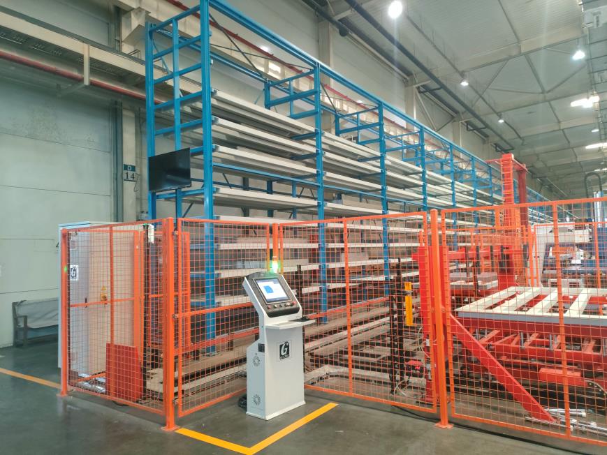Automated raw-material storage and handling line inside the manufacturing facility